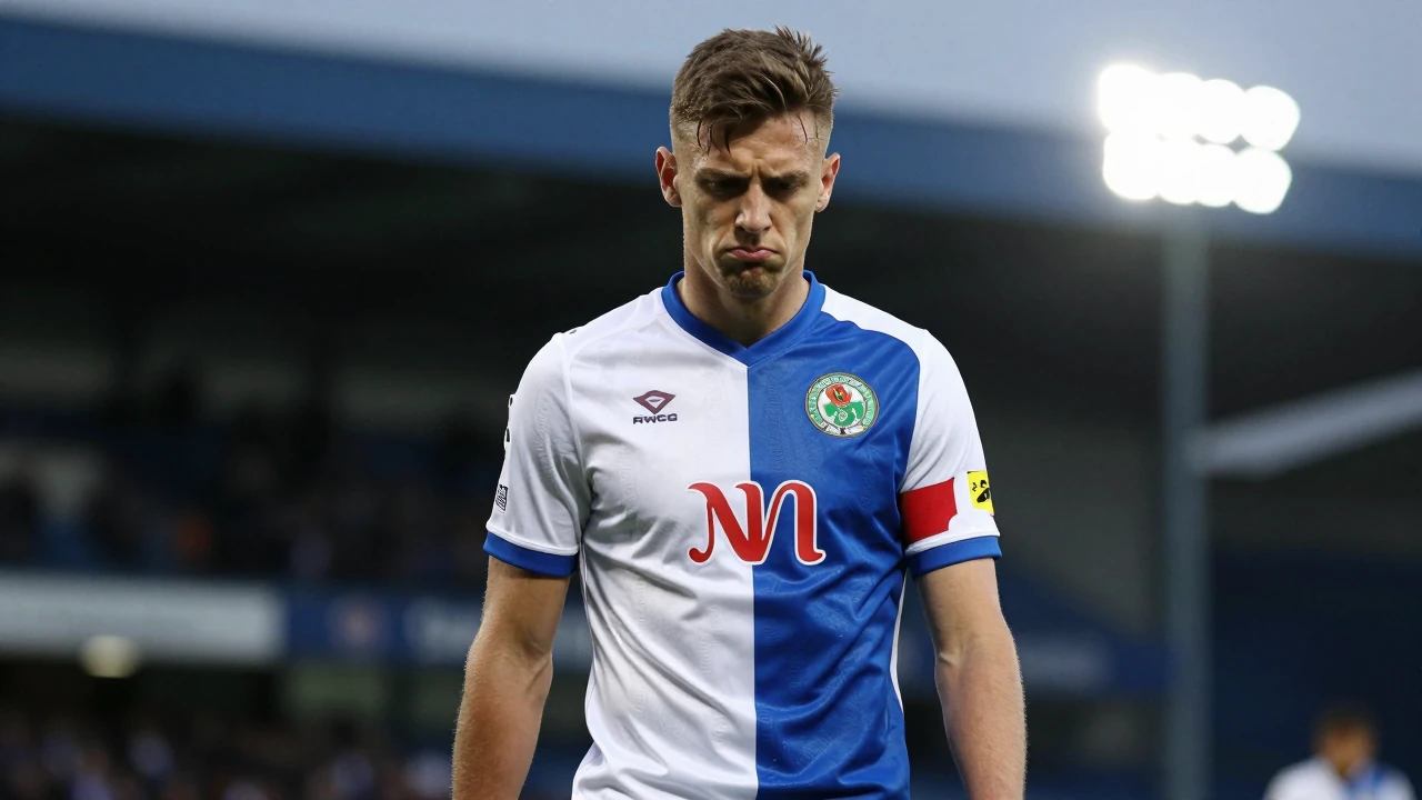 Young, fit midfielder of Shamrock Rovers, waist-up, wearing clean white and blue kit, frowning intensely