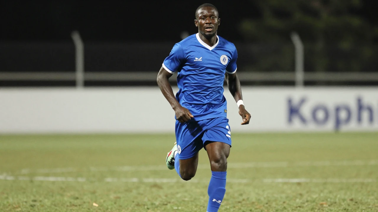 Newport County's Bobby Kamwa runs the length of the pitch to celebrate his goal, impressing fans of his former team