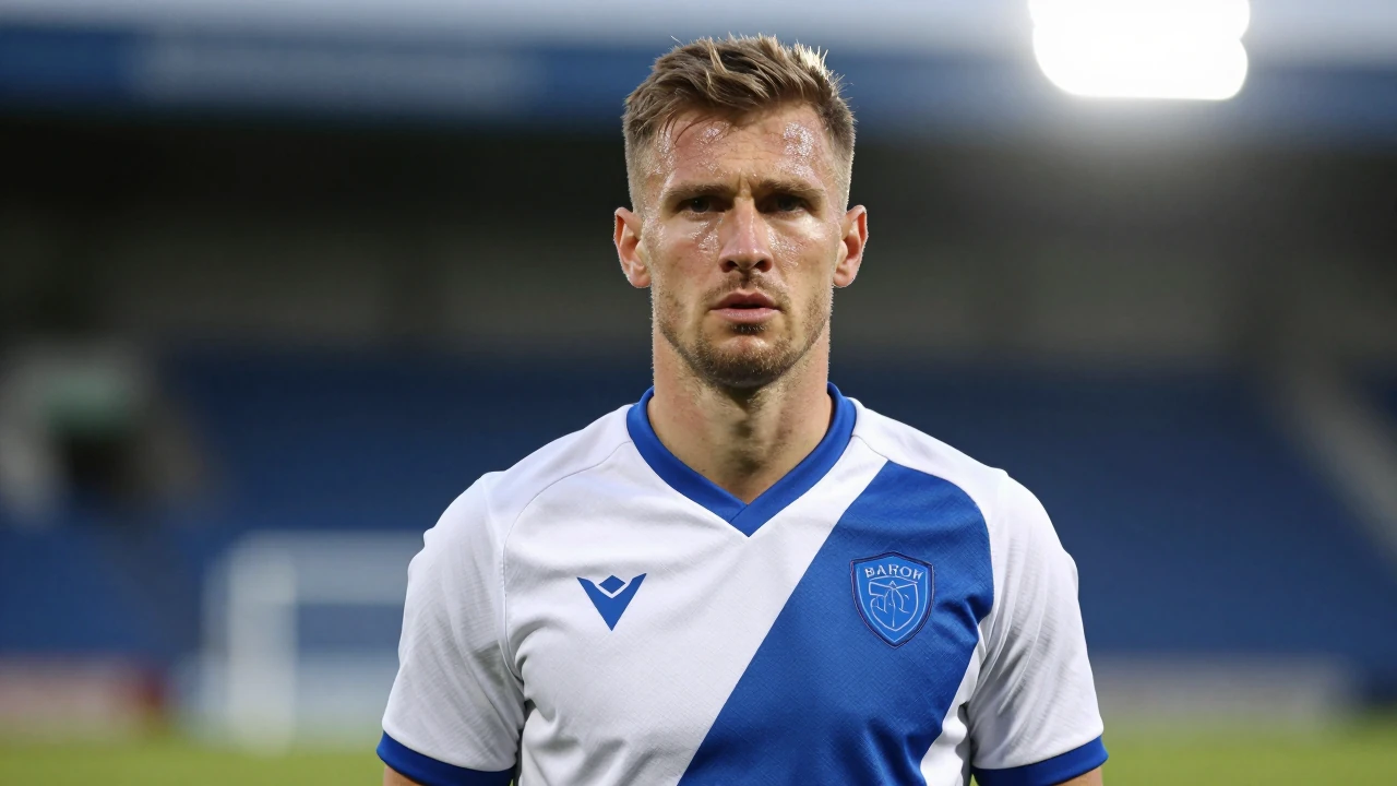 Floodlight rim light: A 30-year-old coach, lean and determined, head-and-shoulders, wearing a clean white and blue Barrow...