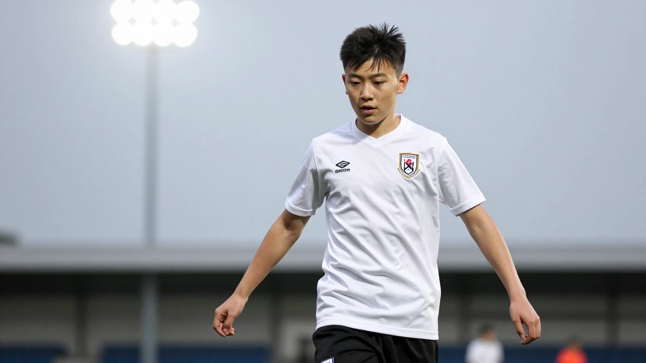 13-year-old Oldham Athletic midfielder, lean and determined, wearing a clean white shirt and black shorts, capturing a...