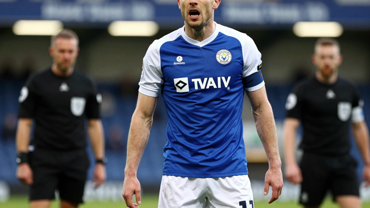 Colchester United's Danny Cowley reacts to the red card that led to their 1-0 friendly defeat at Stevenage, with the team...