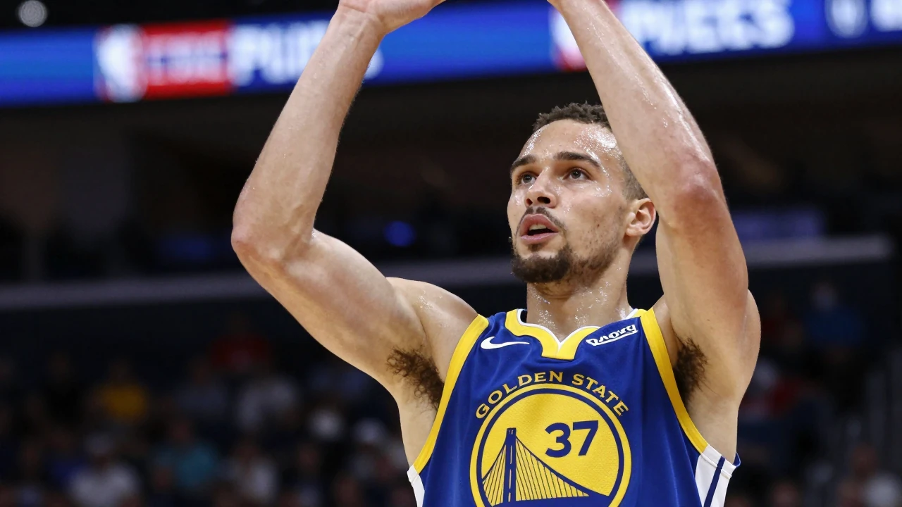Mid-court, a 27-year-old Warriors guard in a bright royal-blue home jersey with the Golden State crest on the left chest...