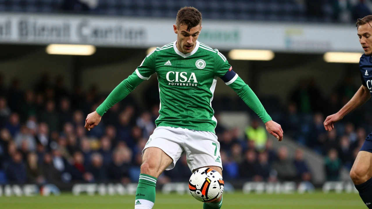A Reuters Connect image shows Hibernian midfielder Jamie McGrath under pressure from Dundee's Drey Wright in the recent...