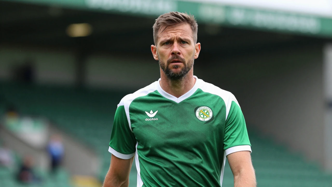Hibernian's Youssef Chermiti suffers an injury in a match against Motherwell, sparking fears about the team's transfer plans