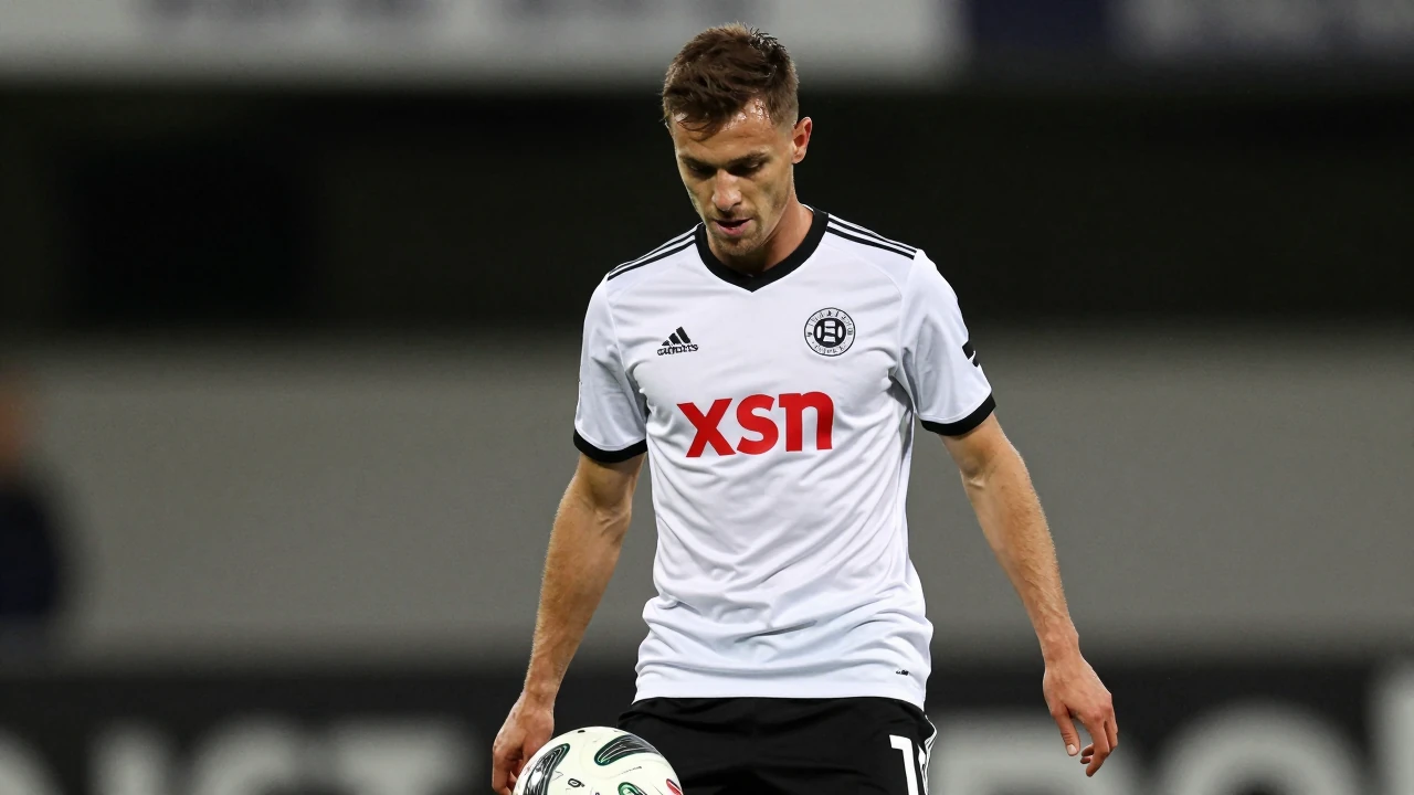 An anonymous Lillestrøm SK midfielder, age 25, in a white jersey and black shorts, head-and-shoulders, intense focus on...