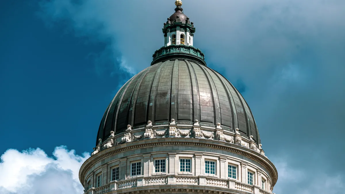 Institutions: Close-up of the Utah State Capitol dome against a striking sky in Salt Lake City.