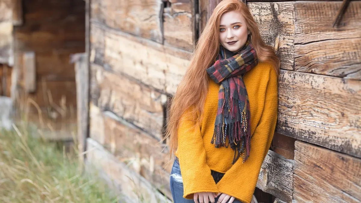 Shades: Red head, ginger, long hair, summer, outdoors, outside.