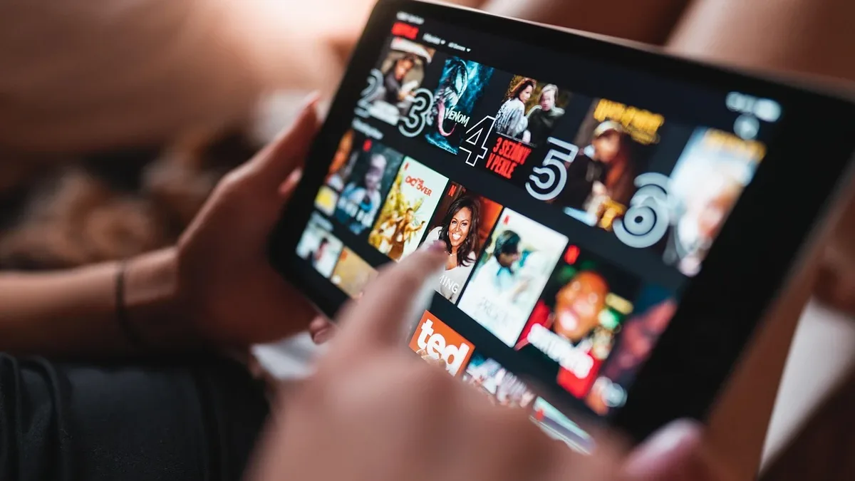 Streaming: Tablet, girl, netflix, watching, entertainment, recreation.