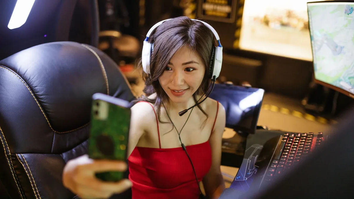 Teams: China's Mu Xinyue, 20, became the first woman to win an esports gold medal at the Asian Games