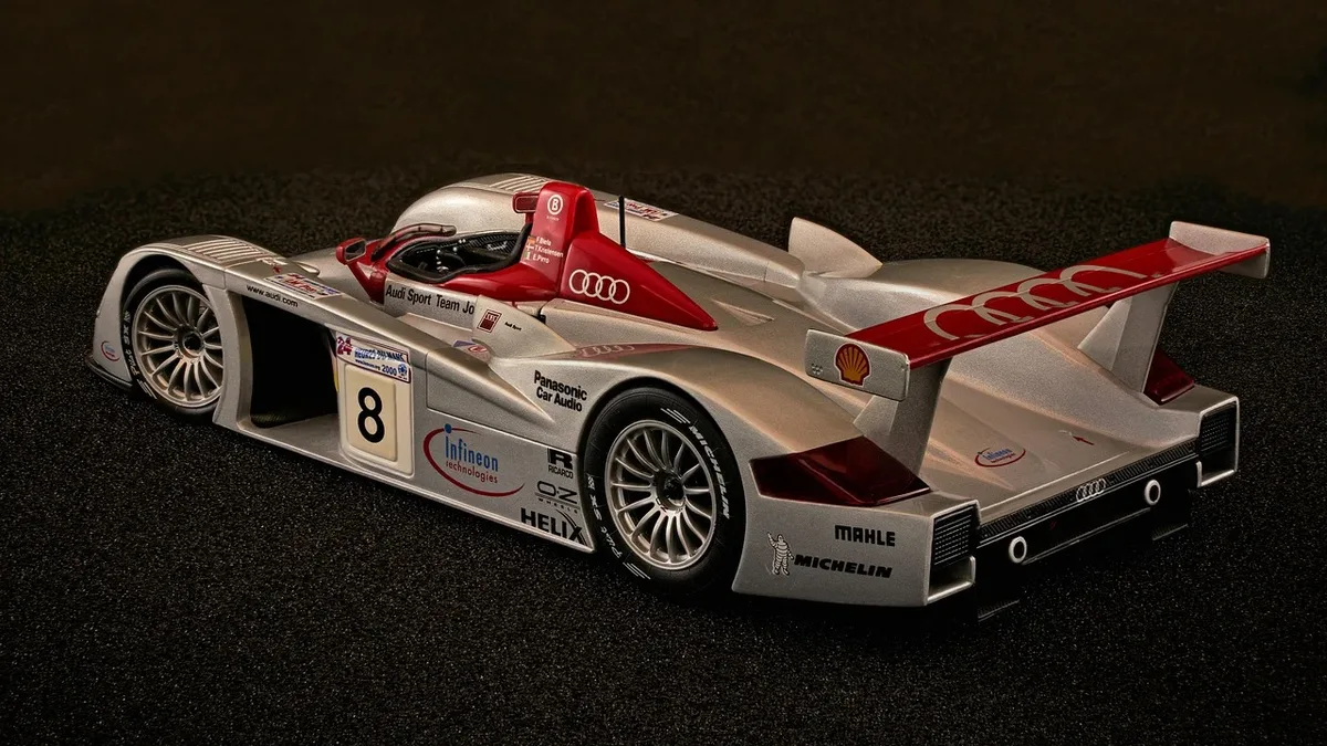 Audi engineers, despite dominating Le Mans with gasoline power, developed a radical aluminum-silicon alloy diesel V12 for...