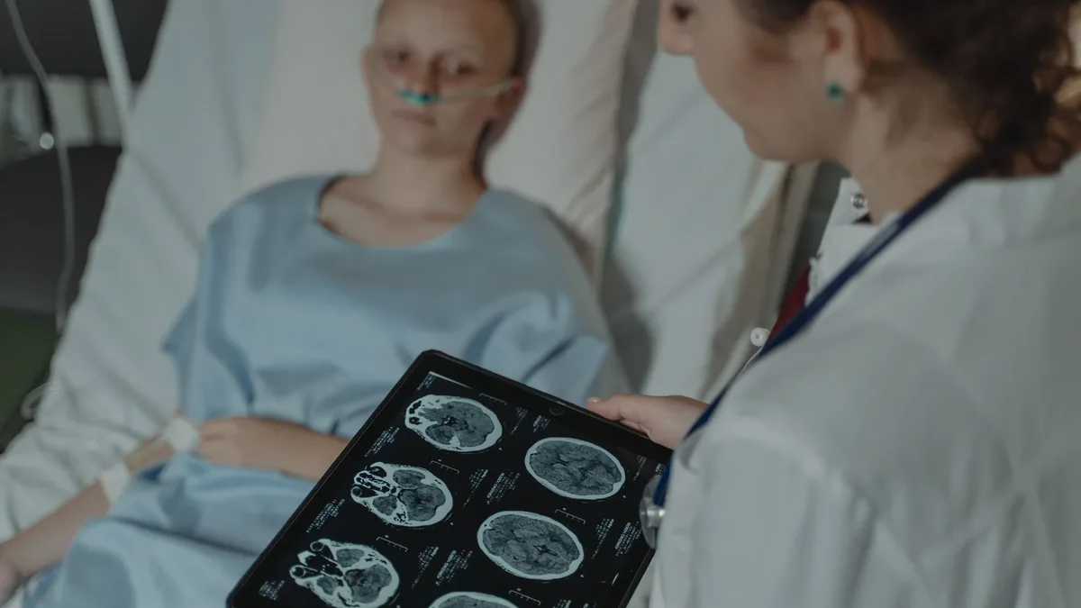 Rhys Hibbert, a 48-year-old father-of-two from Bedfordshire, became the first patient to undergo live AI-assisted brain...