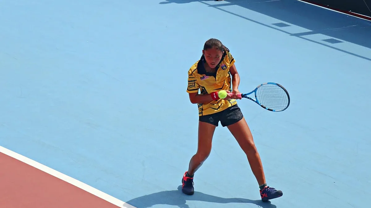 Janice Tjen reached world No.35 after winning a WTA title and a US Open main-draw match, with coach Chris Bint guiding...