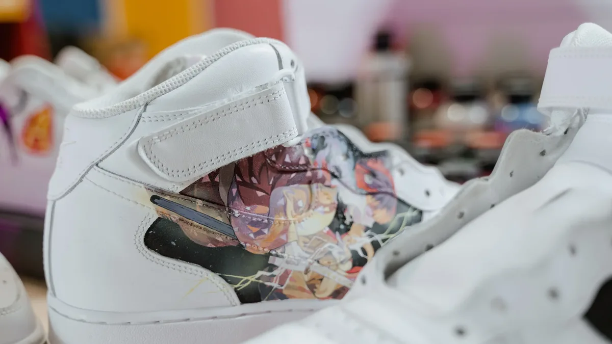A Highsnobiety column critiques recent streetwear-art collaborations from BAPE, KAWS, and Nike as repetitive and lacking...