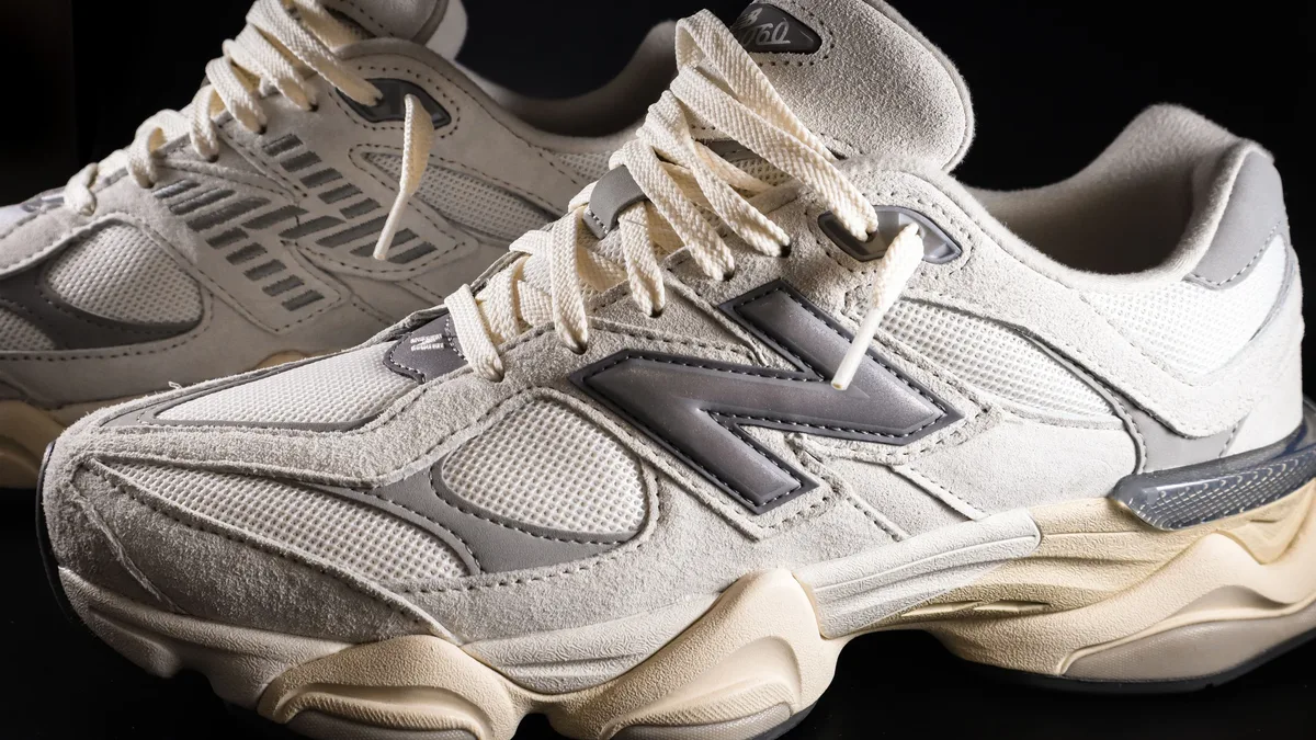The author praises the New Balance ABZORB 2010 as a classic dad shoe that improves with wear, celebrating its chunky...