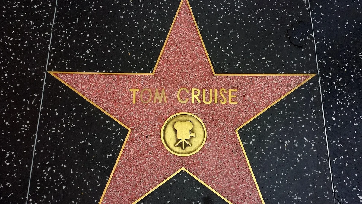 The Industry: A star on the Hollywood Walk of Fame with the name "Tom Cruise" inscribed on it.