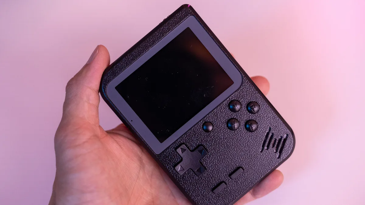 Acer has shown a prototype handheld gaming PC that flips open into a mini laptop, aiming to combine gaming and productivity