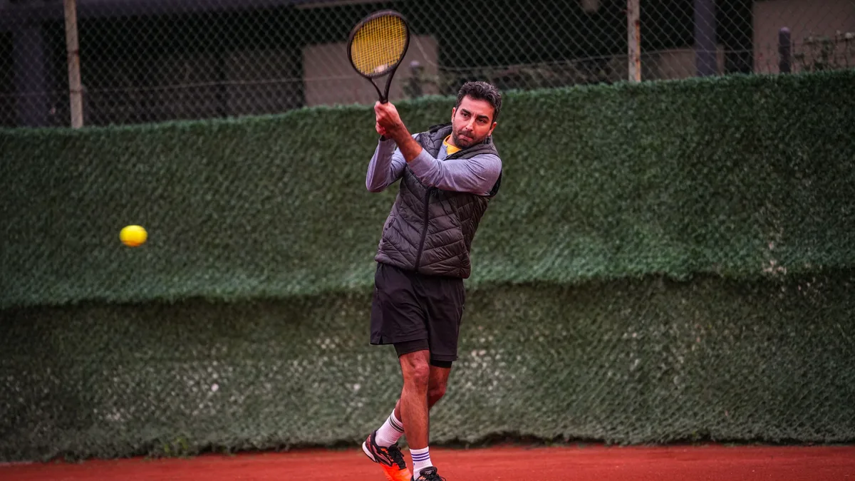 American Ben Shelton, 23, defeated defending champion Carlos Alcaraz in a five-set quarterfinal that ended at 3:33 a.m...