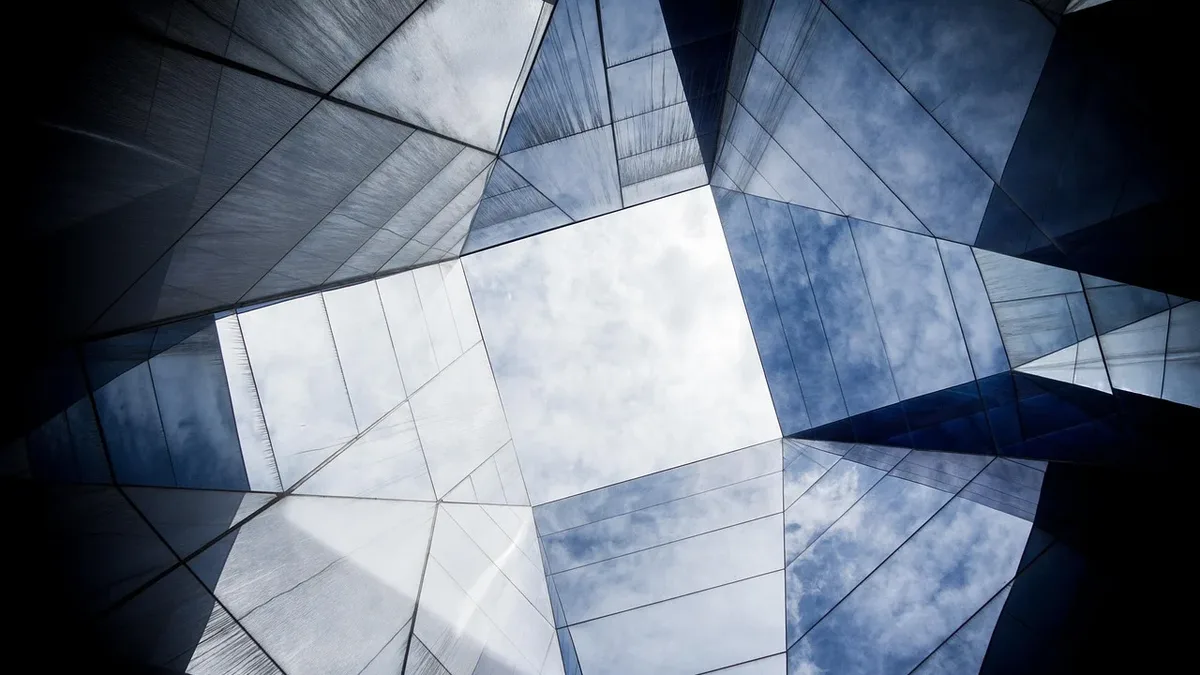 A kinetic art exhibition at the University of Strathclyde uses 16 spinning aluminium panels to create visual analogies...