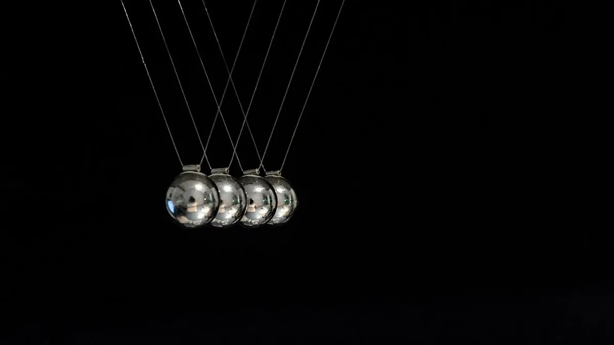 A 13-ion trapped-ion quantum simulator modeled string breaking, a process analogous to quark dynamics and particle...