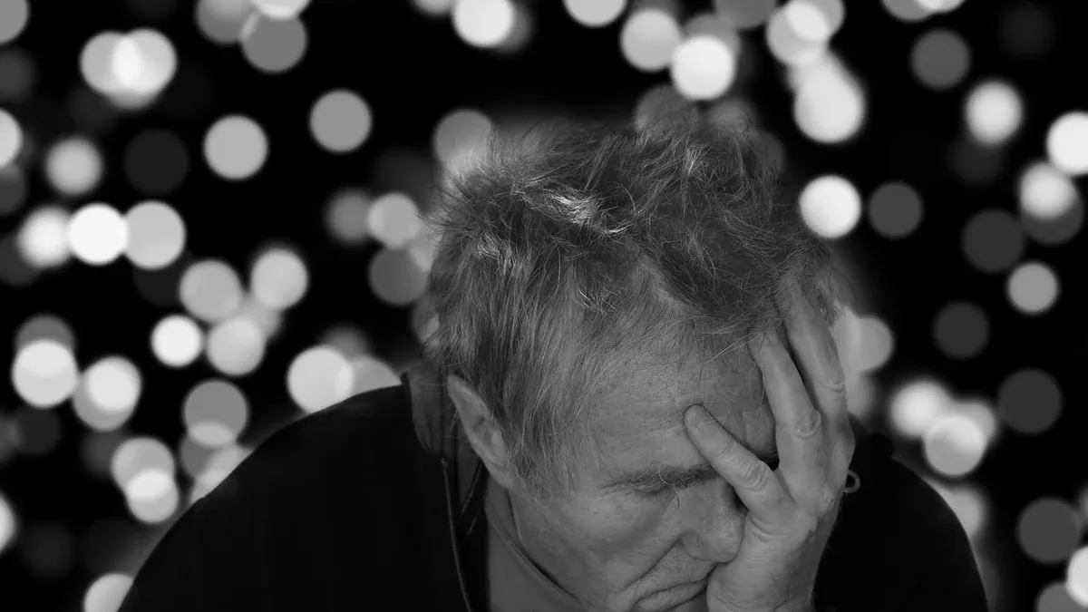 Getting Care: Alzheimer's, man, portrait, face, despair, dementia.