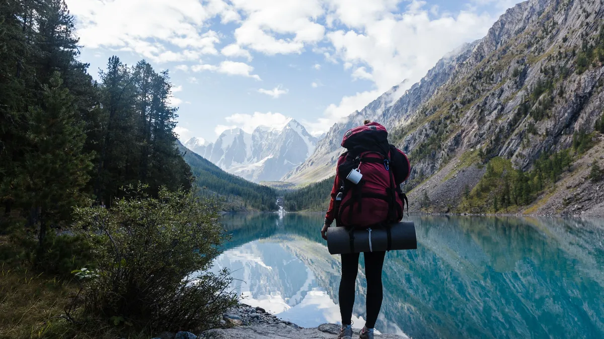 A thru-hiker tackles the challenging Collegiate West section of the Colorado Trail, navigating steep ascents, stunning...