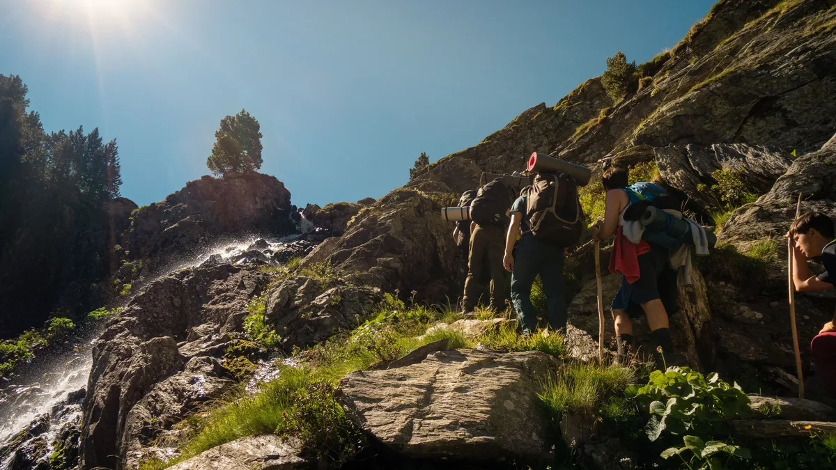 A Pacific Crest Trail hiker takes side quests to Rainbow Falls and Devil's Postpile loop trail, experiencing beautiful...