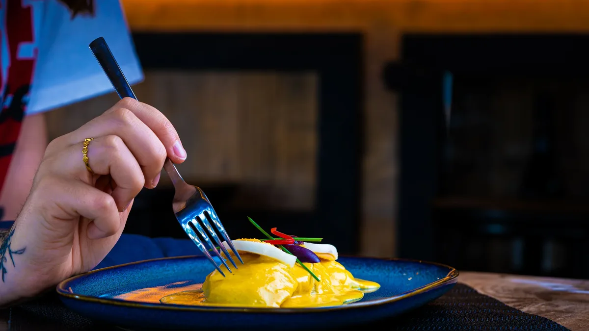 Psychologist Cinzia Pezzolesi explains that comfort eating is driven by the brain's reward system, which links...