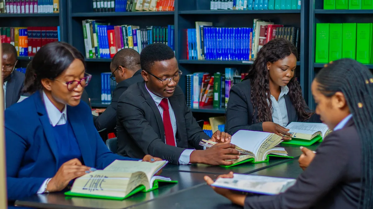A community college dean describes the tension after his institution received a 'Business of the Year' award from the...