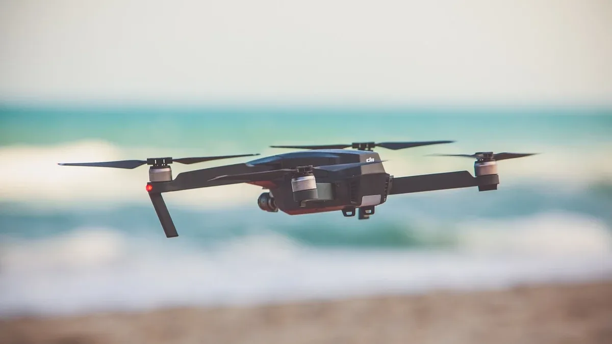 A $34 million state program now monitors NSW beaches with drones from dawn to dusk, aiming to spot sharks and clear swimmers