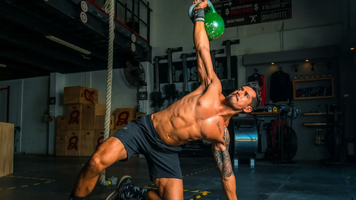 Coach Adam Sinicki recommends the kettlebell halo exercise for building shoulder strength, improving mobility, and...