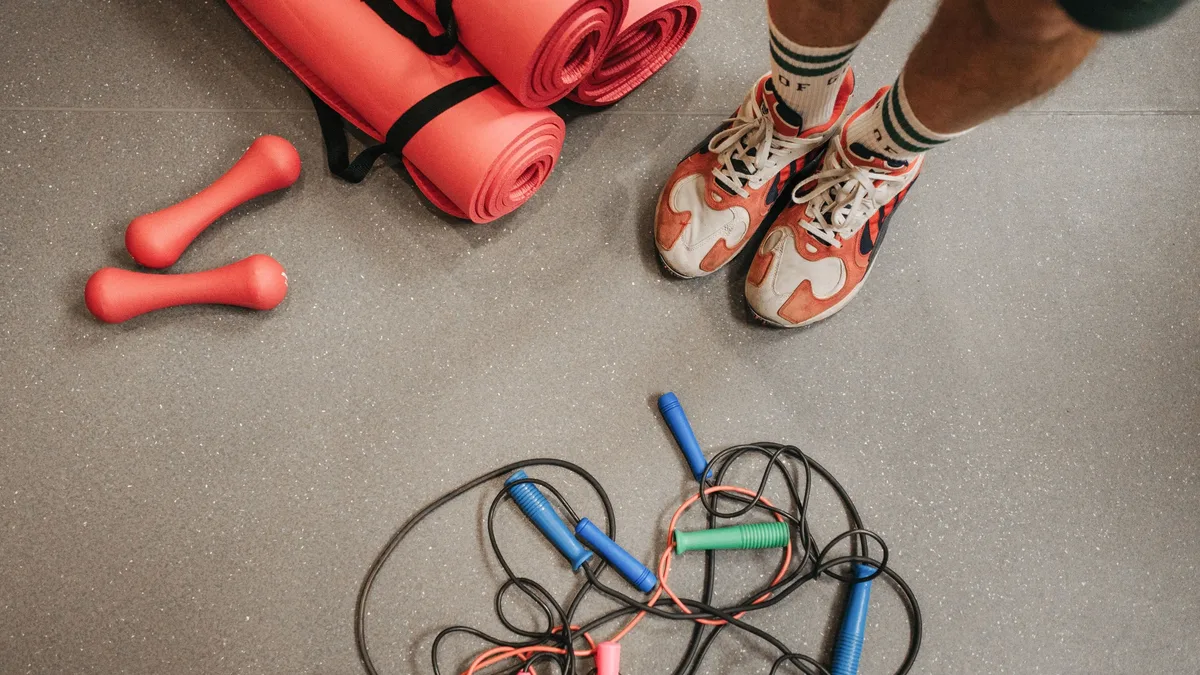 A 300-rep bodyweight leg circuit combines jump squats, split squat jumps, and air squats to build strength-endurance and...