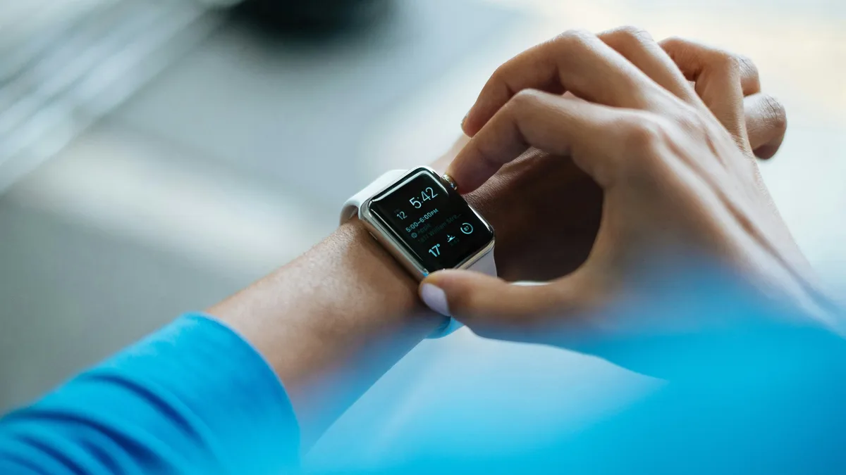 Eating Well: Young Indian man wearing Apple Watch.