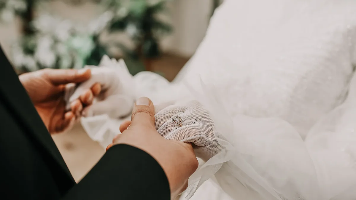 Actress Claudia Sulewski had final fittings for four custom Oscar de la Renta wedding dresses before marrying musician...