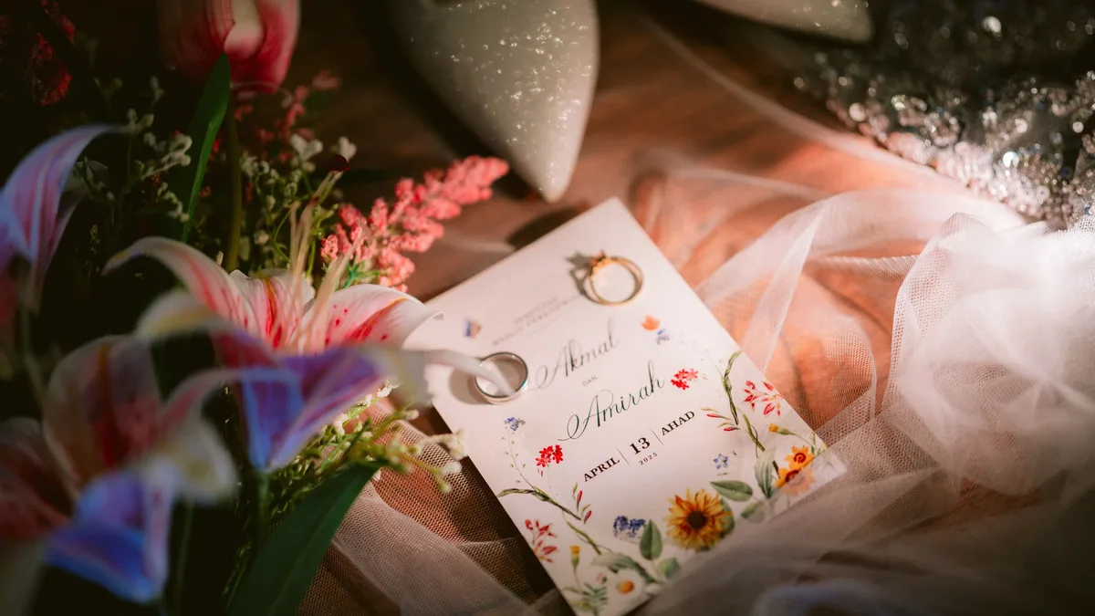 A custom invitation suite set the tone for a Santa Rosa Beach wedding, featuring blue coastal motifs and hand calligraphy