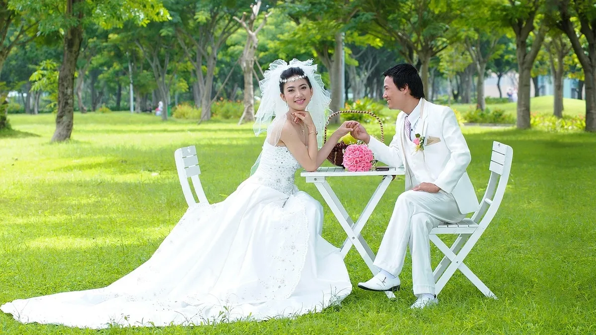 Money: Childhood sweethearts Katie and Calum married at Hilton Park with 155 guests, focusing on food, wine, and music