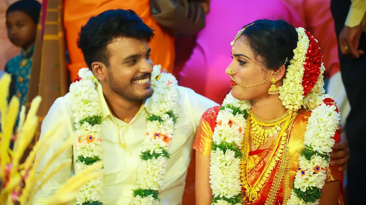 A couple combined Tamil and Scottish heritage in a celebrant-led spring wedding at Dewsall Court, featuring a...