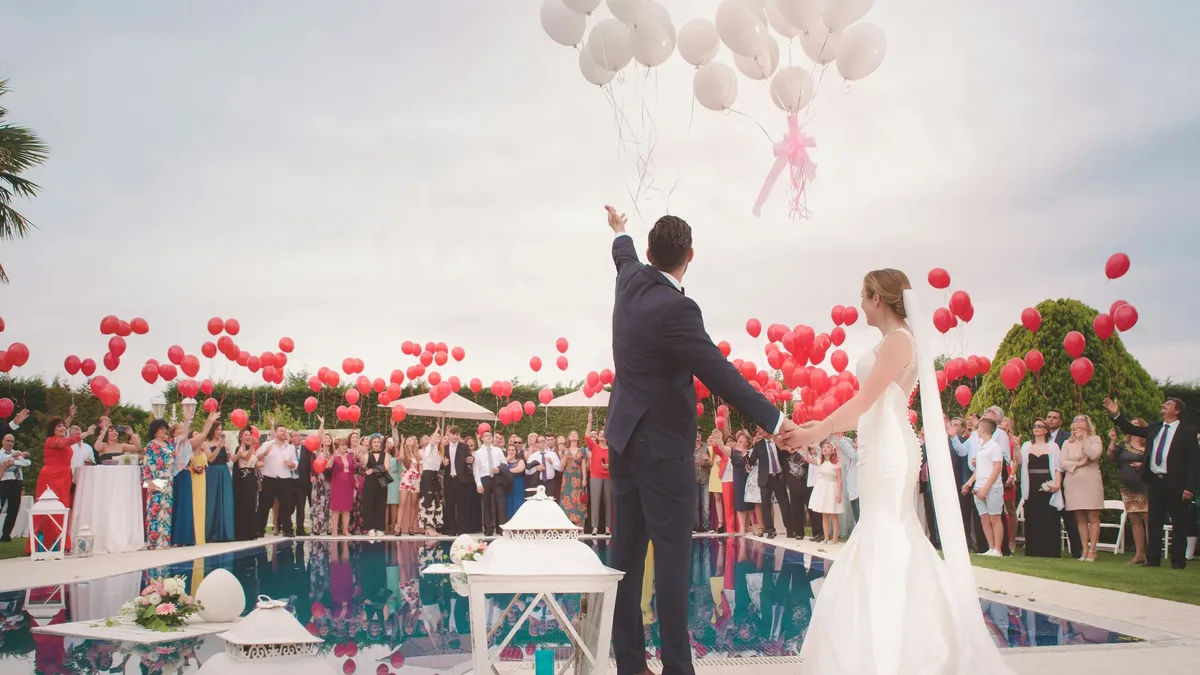 Mike and Lia's wedding was a colorful and joy-filled celebration in Palm Beach, filled with coral, citrus, and martinis