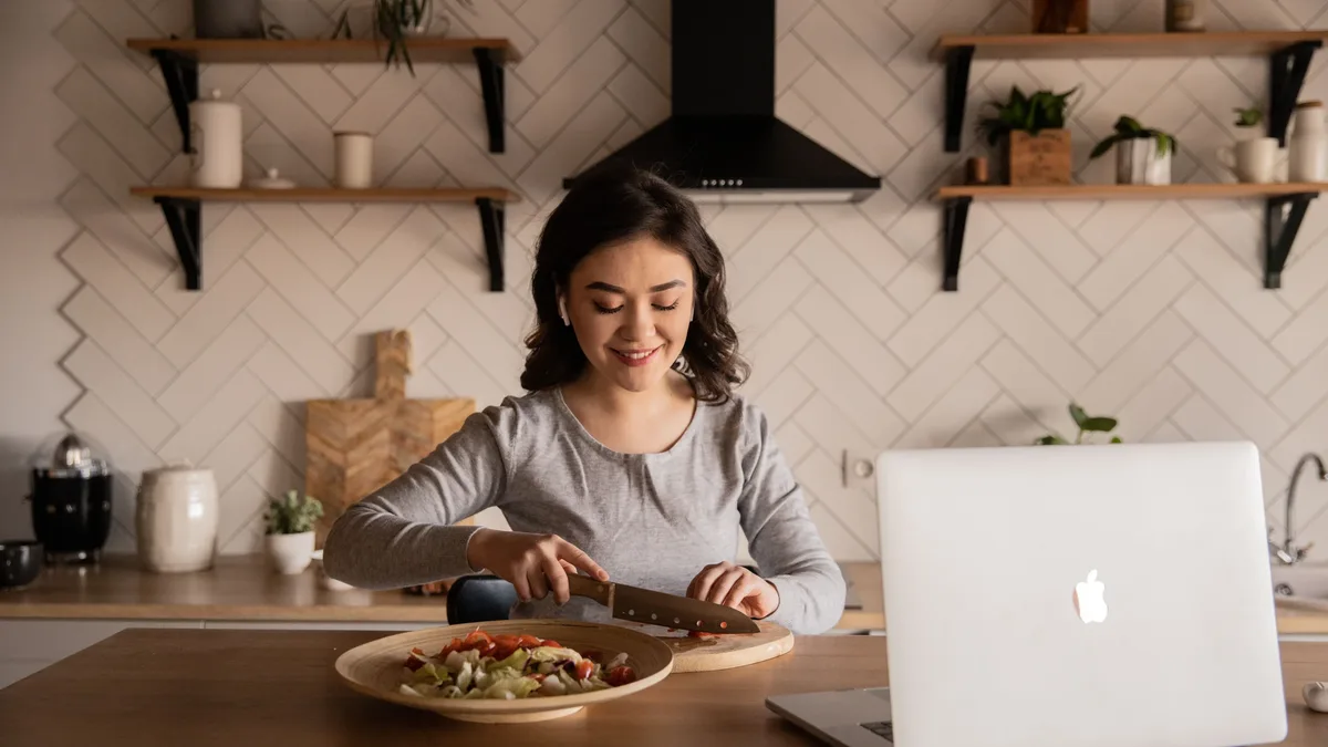 A dietitian prepares a meal using Dolly Parton's iconic recipes, including Chicken and Dumplings, Miracle Madness Salad...