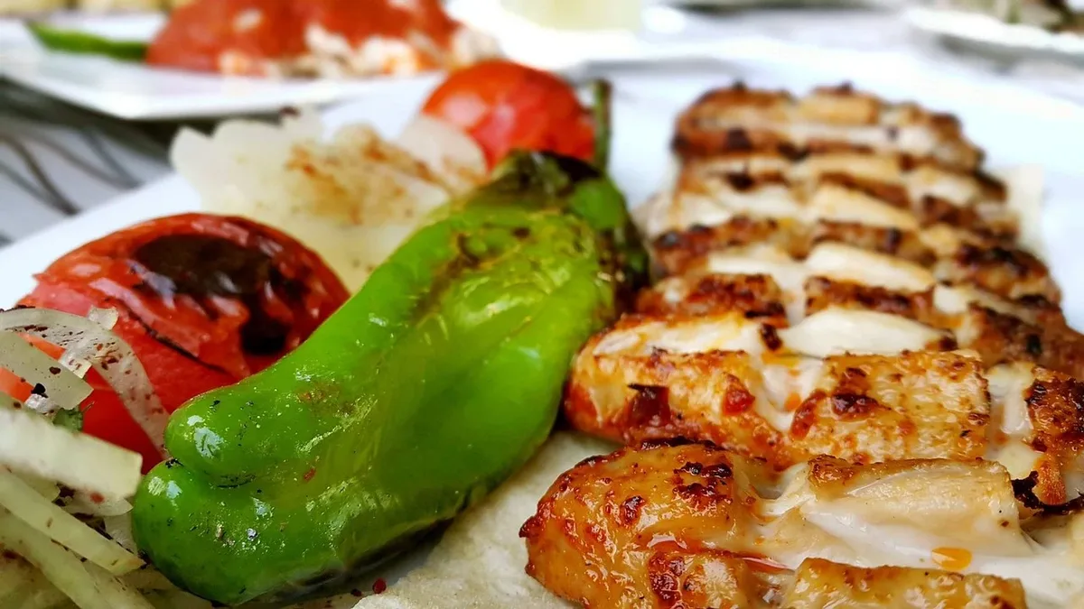 Food & Wine has compiled 25 reader-approved recipes for a Labor Day celebration, focusing on grilled dishes and...