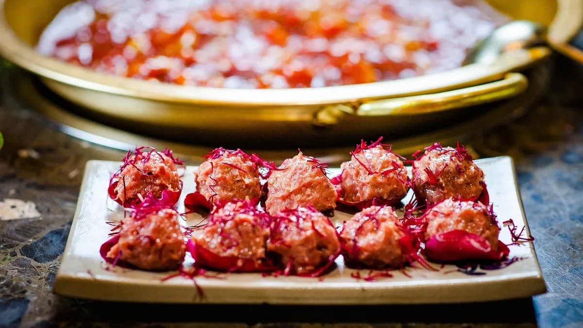 A recipe for baked chicken meatballs incorporates grated pumpkin and mushrooms for added fiber and flavor, offering a...