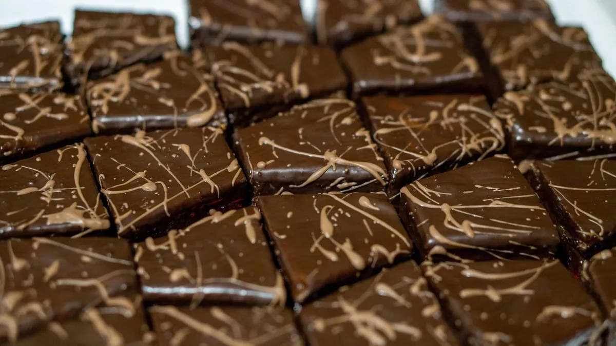 A recipe for fudgy brownies topped with dulce de leche and sea salt uses an unconventional creaming method to keep the...
