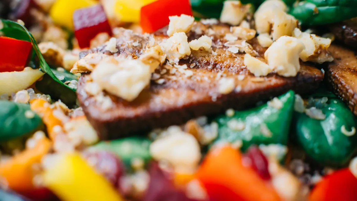 Cooking For: A fresh Chinese cold dish that blends blanched spinach, tofu skin, roasted peanuts and a savory sauce