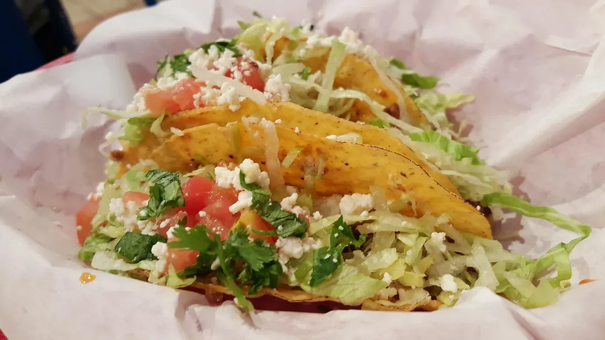 Serious Eats shares 12 make-ahead taco recipes with pork, chicken, beef, and seafood fillings to simplify back-to-school...