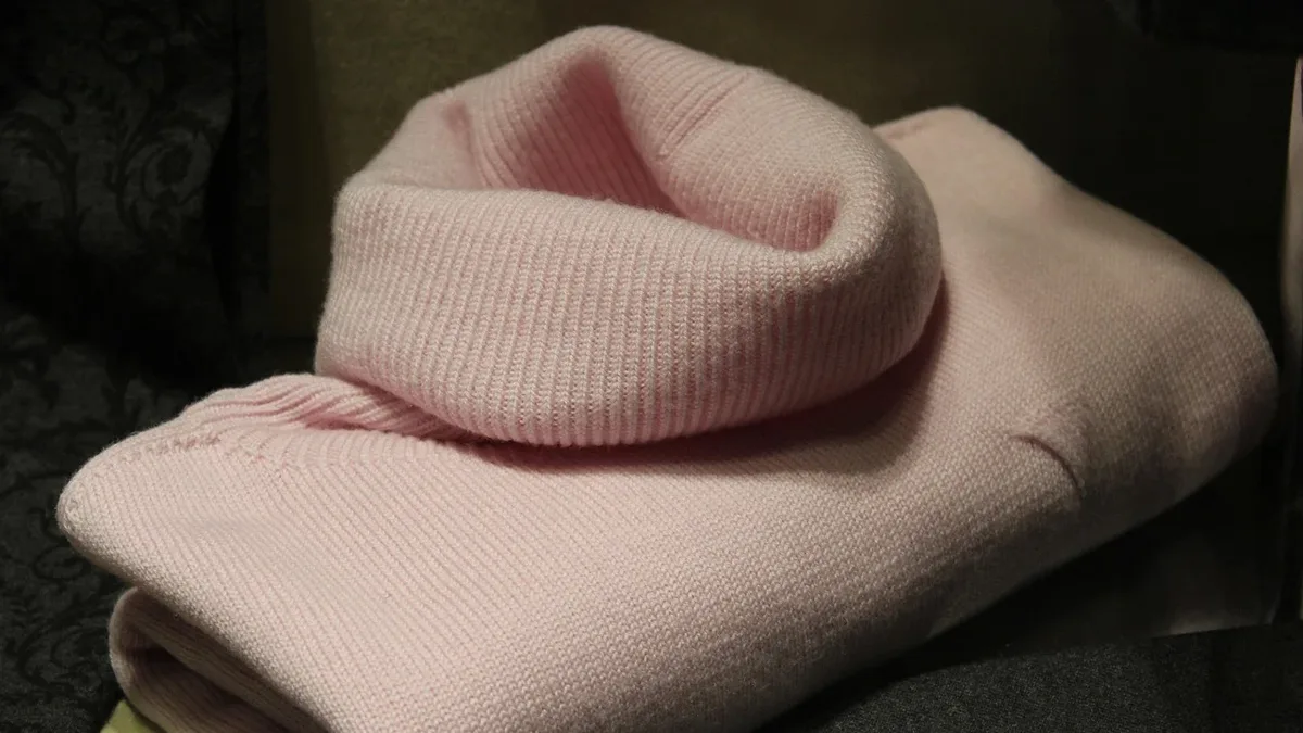 J.Crew introduces its Tiny Rollneck, a shrunken, fitted and slightly cropped version of its signature Rollneck sweater...