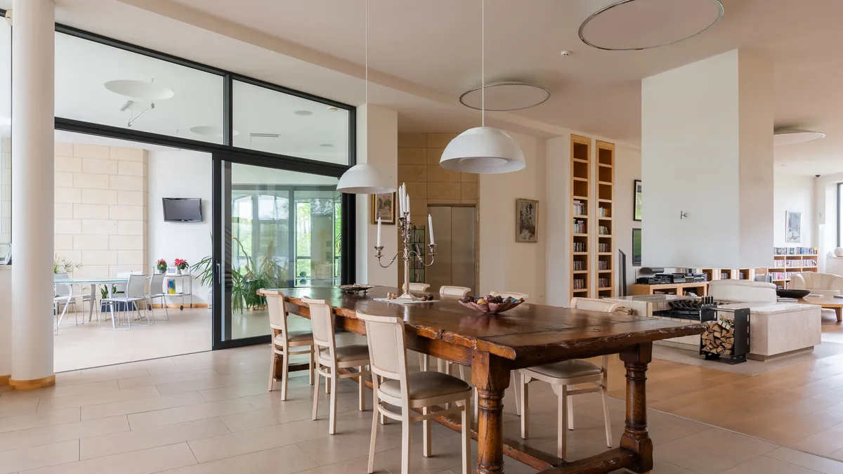 Sofa.com is marking its 20th year by expanding into dining and bedroom furniture, driven by customer trends like 'Sofa...