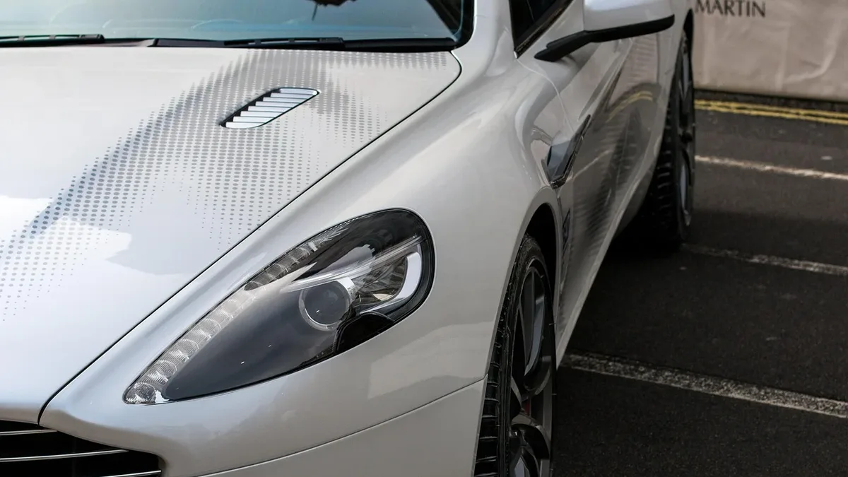 Aston Martin has pushed back its first battery-electric car to at least 2033, with CEO Adrian Hallmark confirming a new...