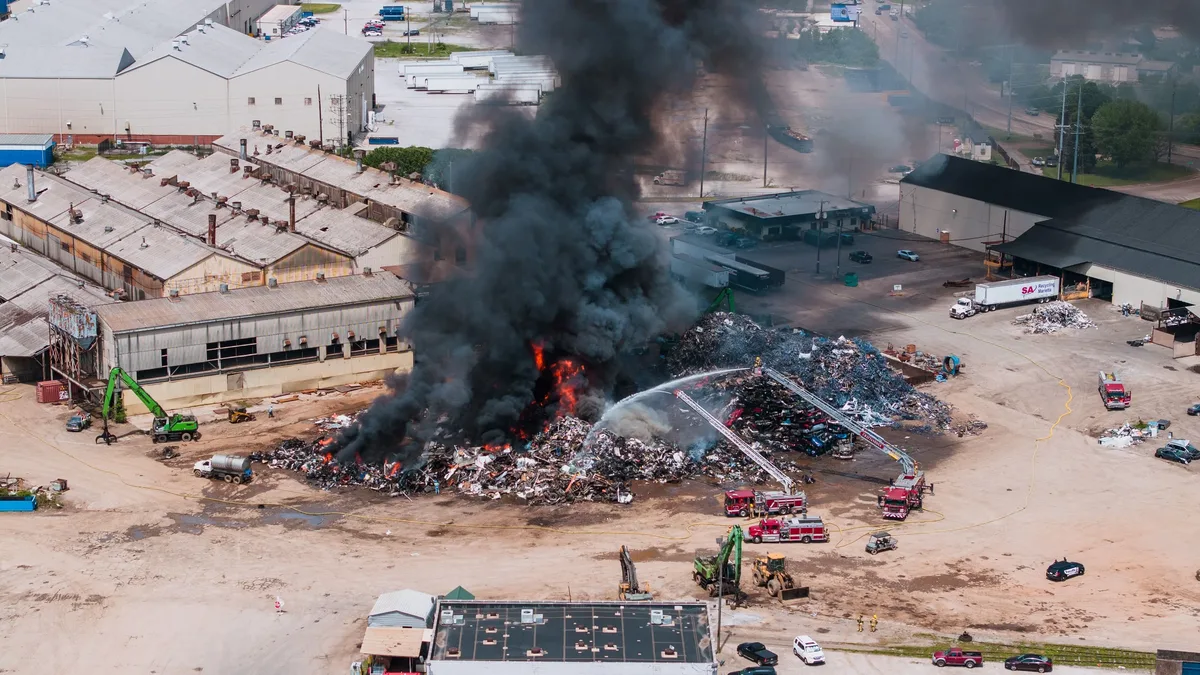 Four vehicles were completely destroyed in a fire at the TIS Square parking lot in Tebet, Jakarta, with fire officials...