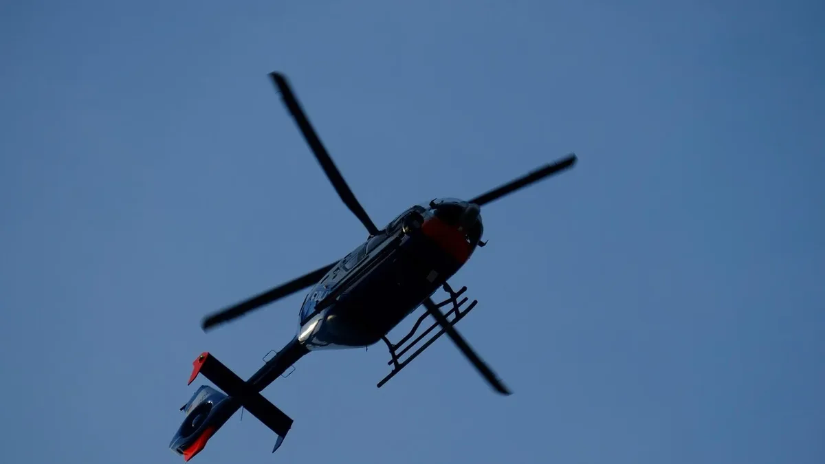 The NTSB's preliminary report states an Airbus AS350 B2 news helicopter was in a rapid descent before striking a storage...