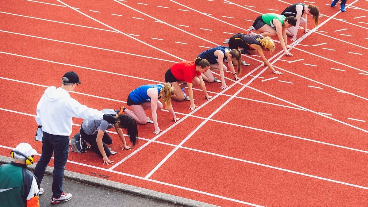 Two running coaches detail how they would spend $300 to improve performance, with one prioritizing a race entry, shorts...