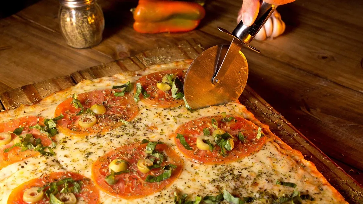 Recognition: Domino's has launched a domino-shaped Detroit-style personal pizza nationwide